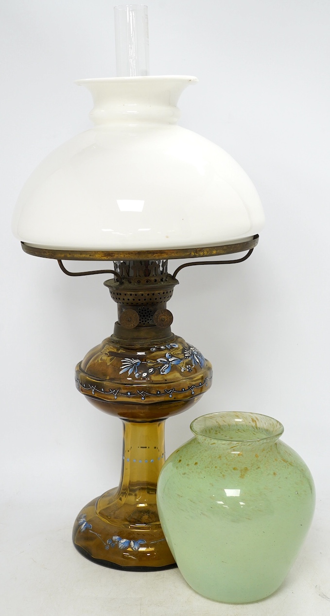 A Vasart glass vase, and an enamelled glass oil lamp, lamp 56cm high. Condition - both good